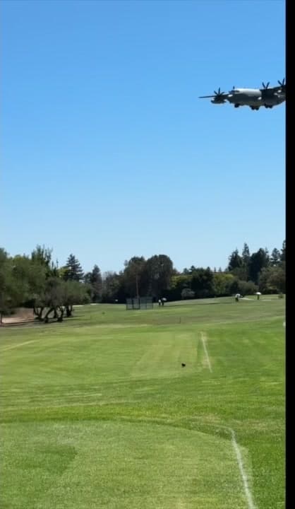 The aircraft continues across the course.