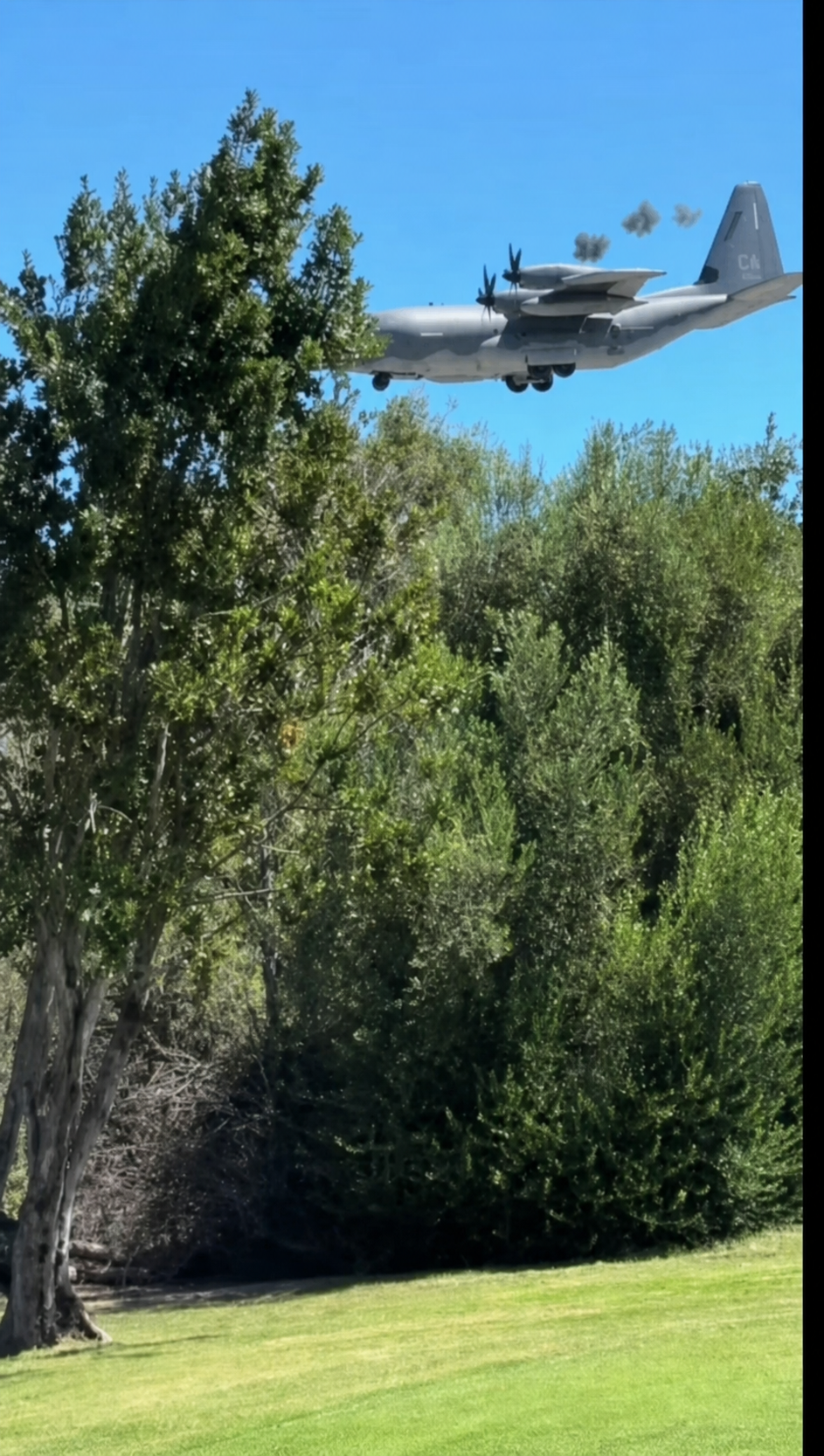 One engine appears to sputter as the aircraft departs.